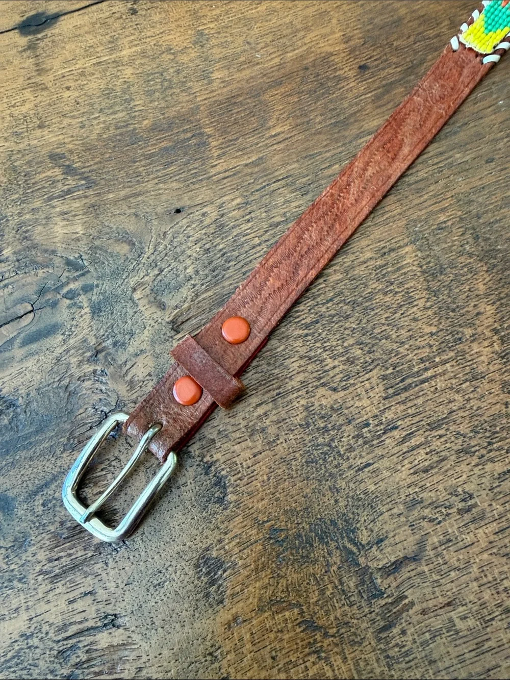 Child’s souvenir beaded belt with brown leather